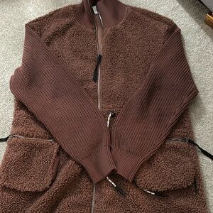 varley zip up with sherpa on outside